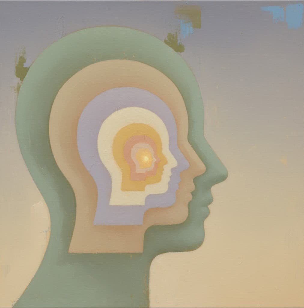 Nested head profiles opening toward a small light at the center